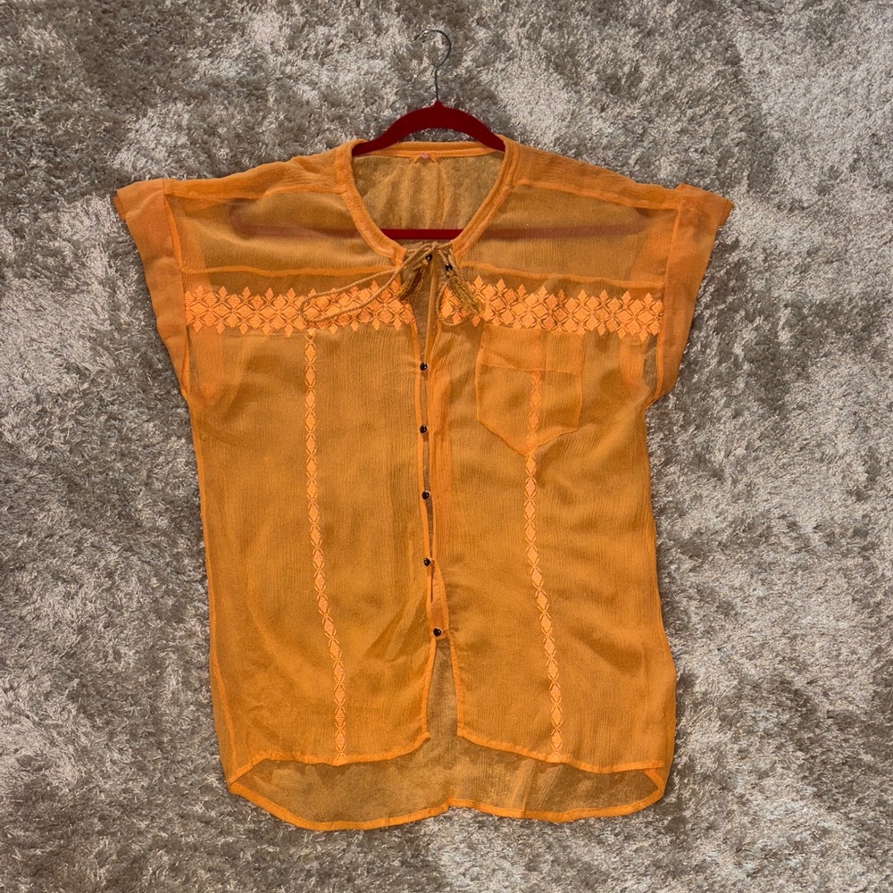 A delicate, elegant women's blouse made of crinkled silk.